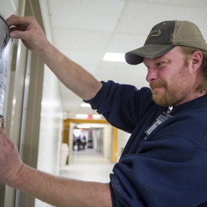 Pete Graf with WSI Sign Systems will be busy over the next week installing new wayfinding signs on levels 0 and 1.