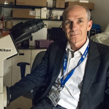 Dr. Vanner at the microscope